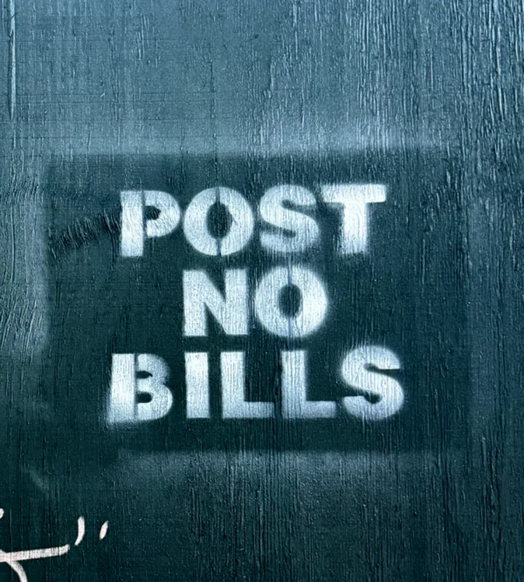 Soft-edged white stencil sprayed on teal-painted plywood.